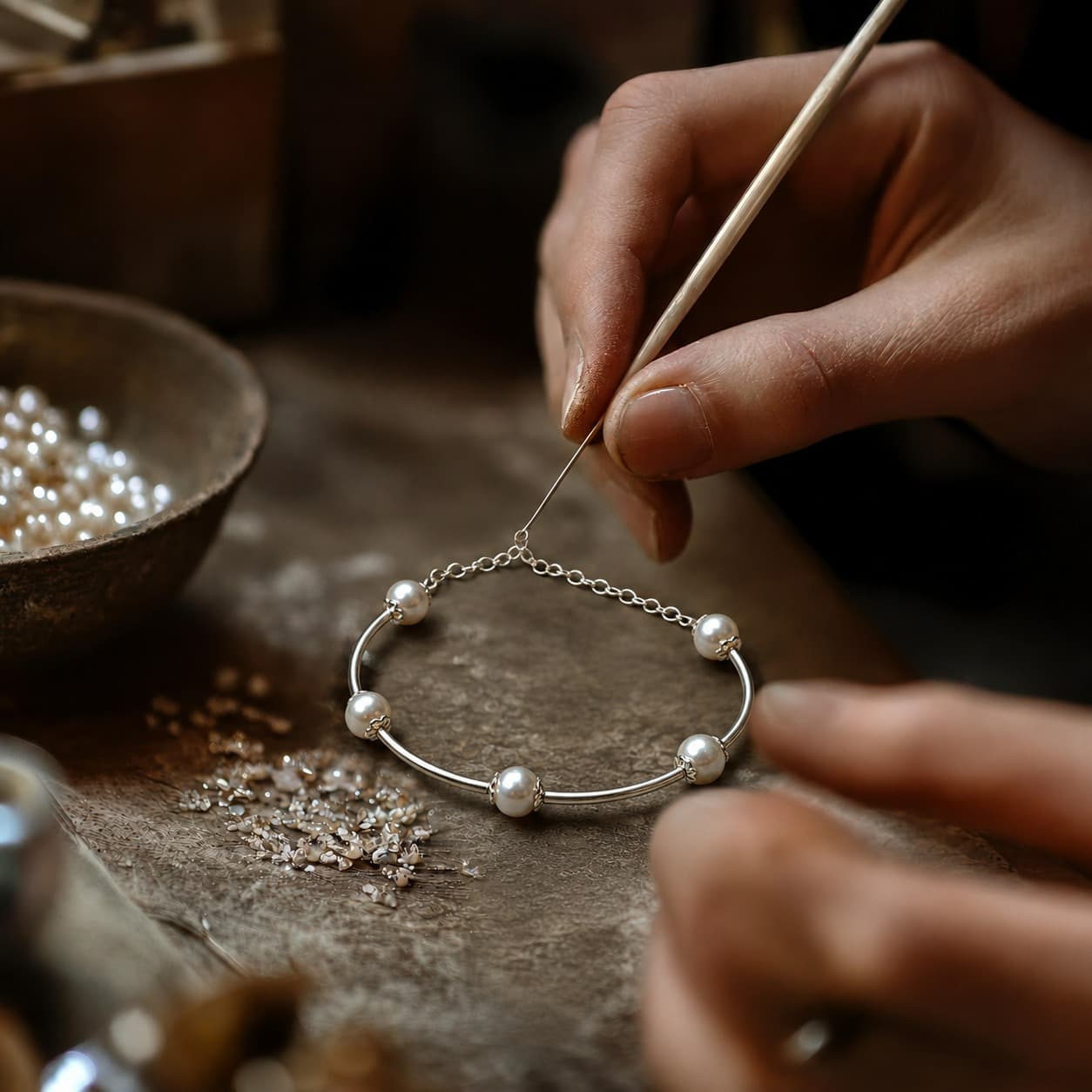 Skilled karigars handcrafting pearl jewellery